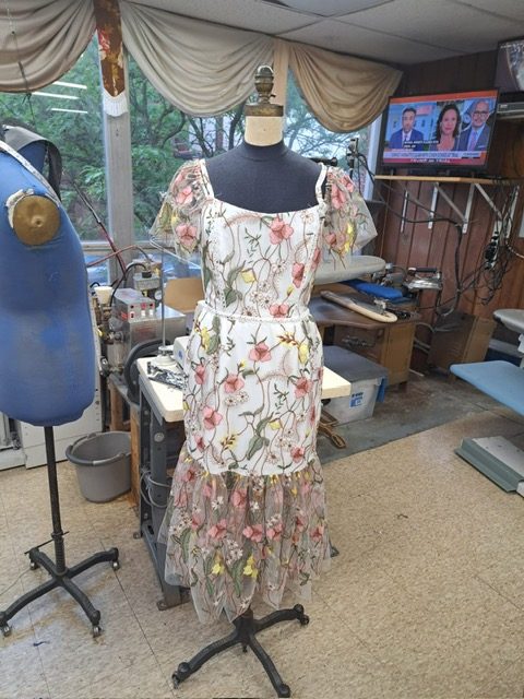 Garment fitted and pinned on a tailoring mannequin